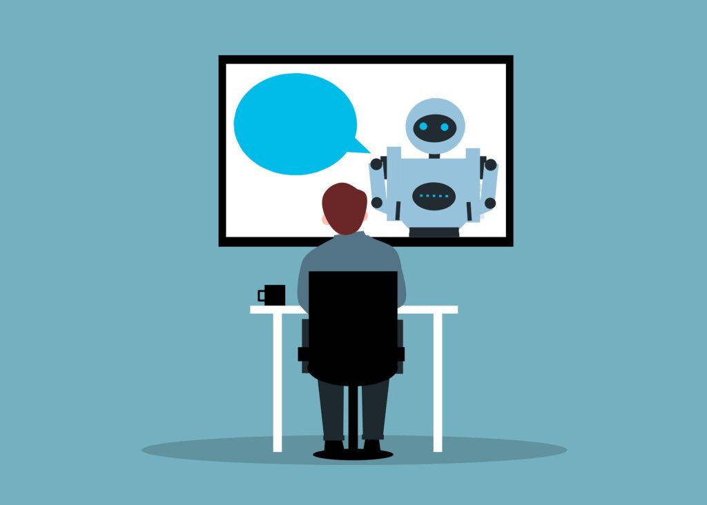 Employee chatting to a chatbot as new adoption data from Perplexity reveals how AI agents are driving workflow efficiency gains by taking over complex enterprise tasks.