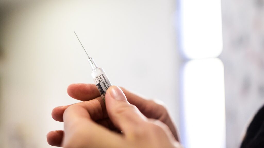 Flu cases; Venezuela-U.S. tensions; Iran protests : NPR