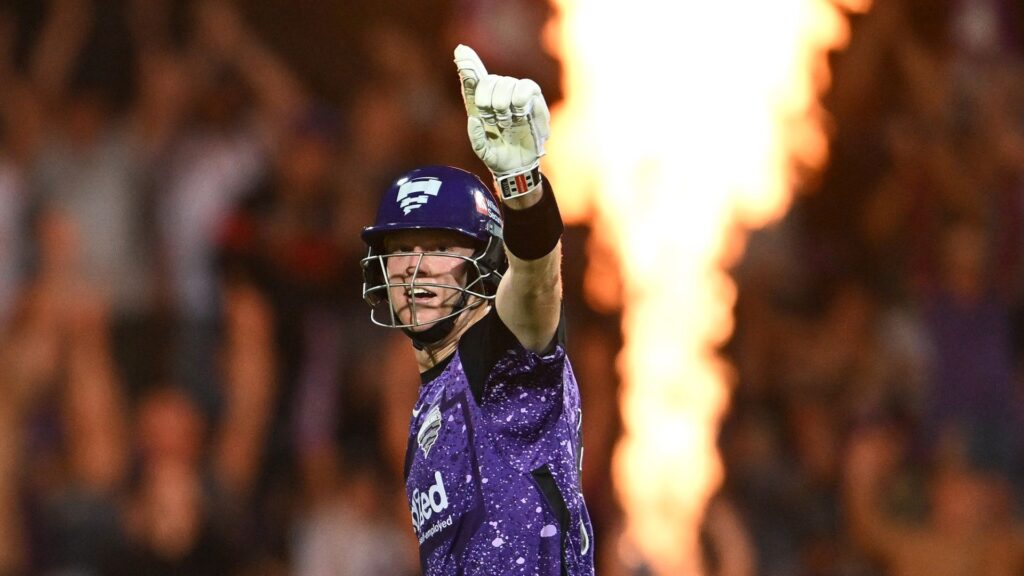 Mitch Owen celebrates scoring a century for reigning Big Bash League champions the Hobart Hurricanes