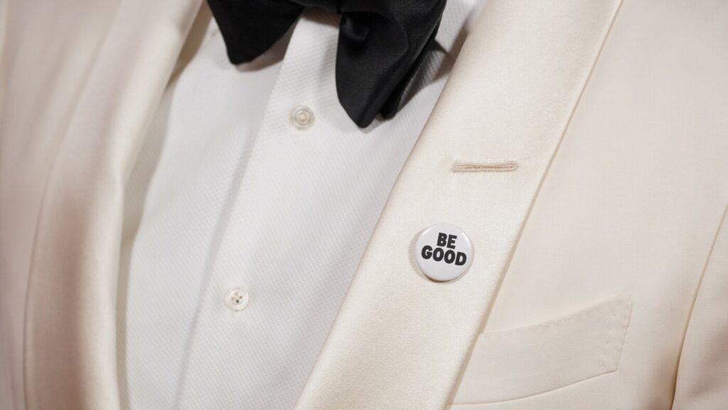 Celebrities wear pins protesting ICE at the Golden Globes : NPR