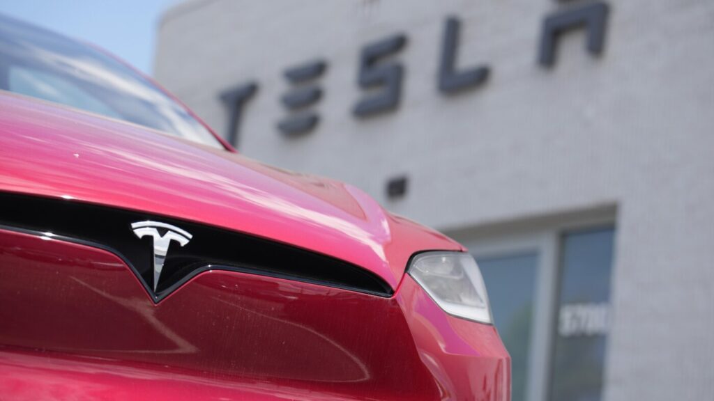 Elon Musk focuses on robotics as Tesla profits slumped 46% last year : NPR