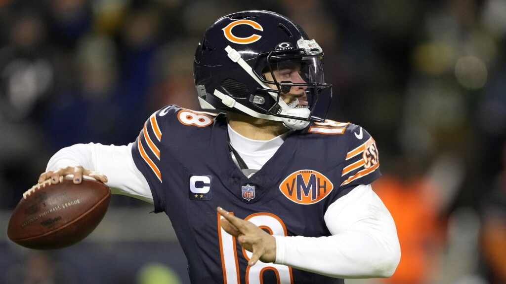 Chicago Bears quarterback Caleb Williams throwing a pass during the NFL Playoffs