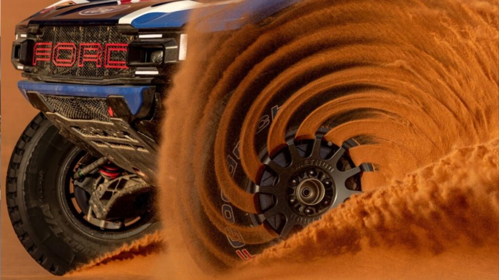 The Fluid Dynamics Behind This Unreal Ford Raptor Sand Spiral Photo