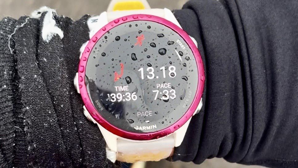 I wear an Apple Watch every day — but here’s the simple reason why I swapped to Garmin for my half-marathon last weekend a photo of the Garmin Forerunner 570 in the rain