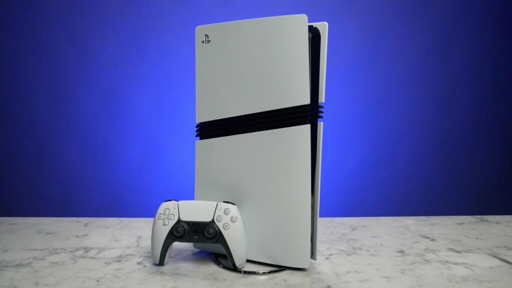 PlayStation 6 Rumors: Potential 2029 Release, Specs, Pricing and More A PlayStation 5 Pro sits vertically on a table in front of a blue background. A gaming controller sits next to it.