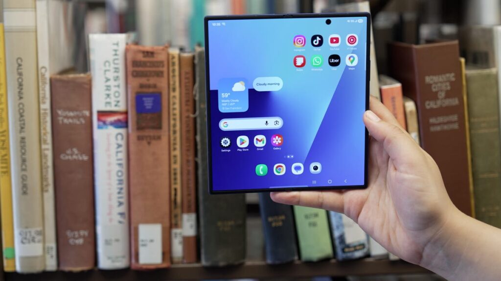 Samsung’s One UI Code Hints at Existence of ‘Wide’ Galaxy Z Fold A hand holds an unfolded Galaxy Z Fold 7