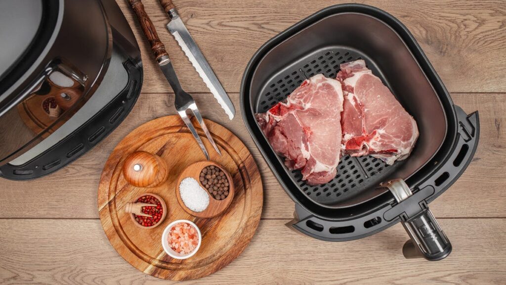 Pork chop in air fryer basket
