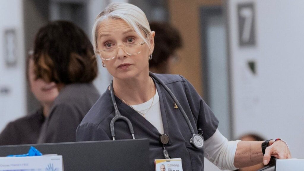 Dana looks at something down the hall