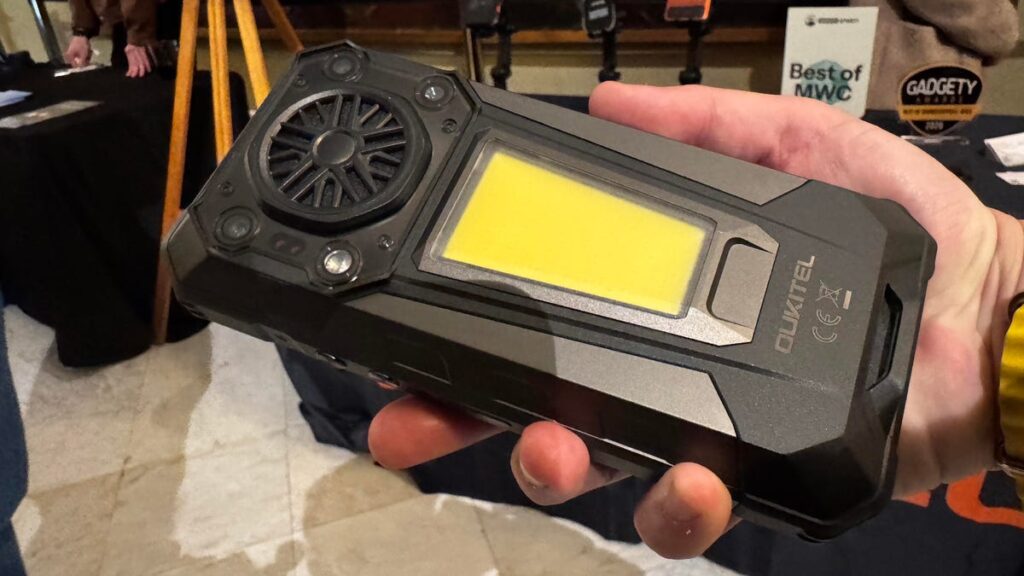 A rugged phonef rom the back showing its huge speaker and light -- honestly, it looks like a GPU.