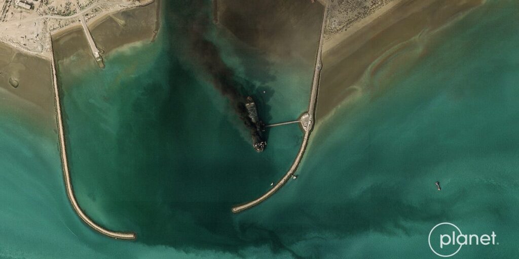 Satellite Image Shows Iran's Largest Warship, a Former Tanker, on Fire