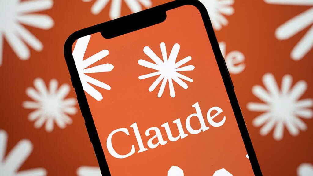 The Claude AI logo is displayed on a smartphone screen with a multitude of Anthropic language model logos in the background.