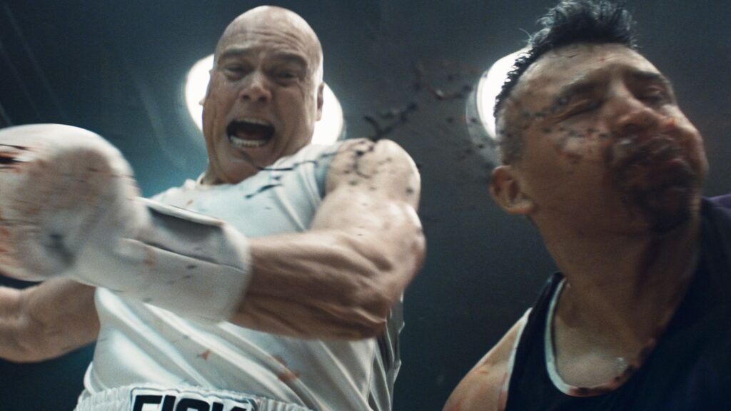 Wilson Fisk punching a competitor during a boxing match in Daredevil: Born Again season 2