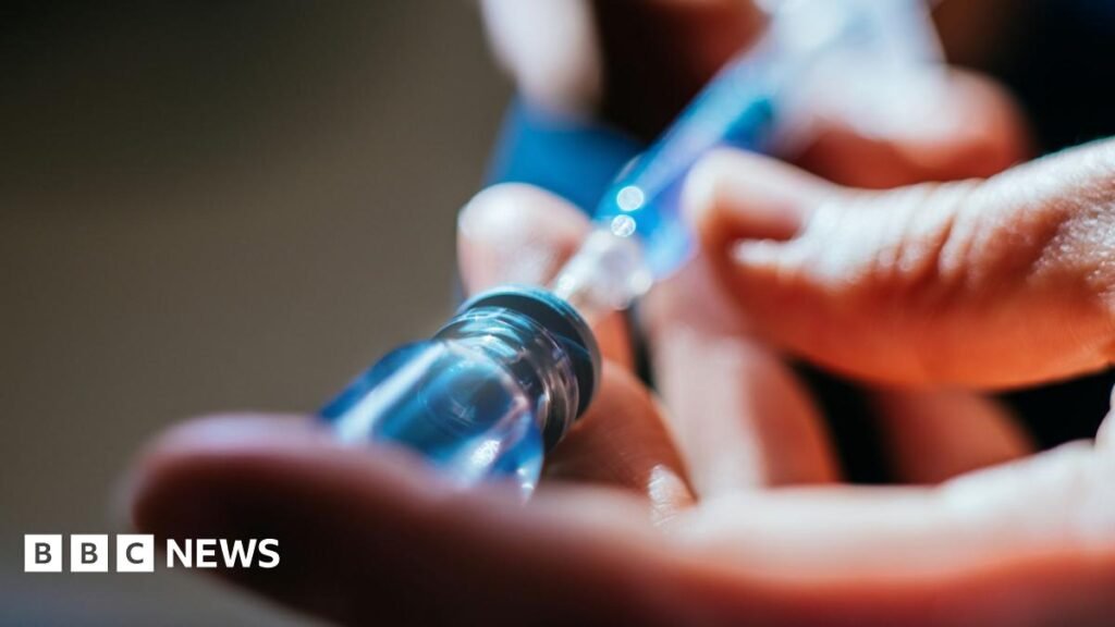 German doctor jailed for murder of 15 patients and suspected of more A close up of a person's hands as they prepare an injection