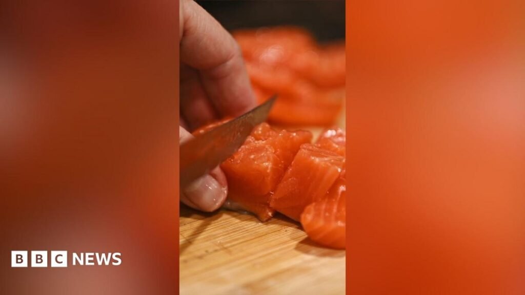 Salmone sliced with a knife